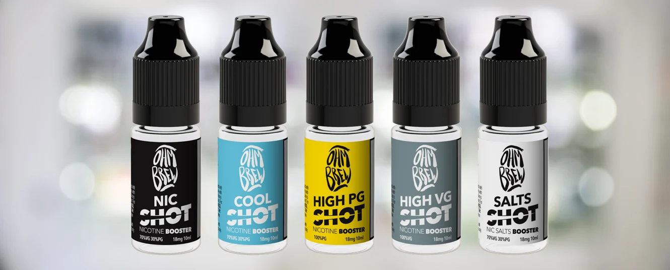 A line of nic shot e-liquid bottles